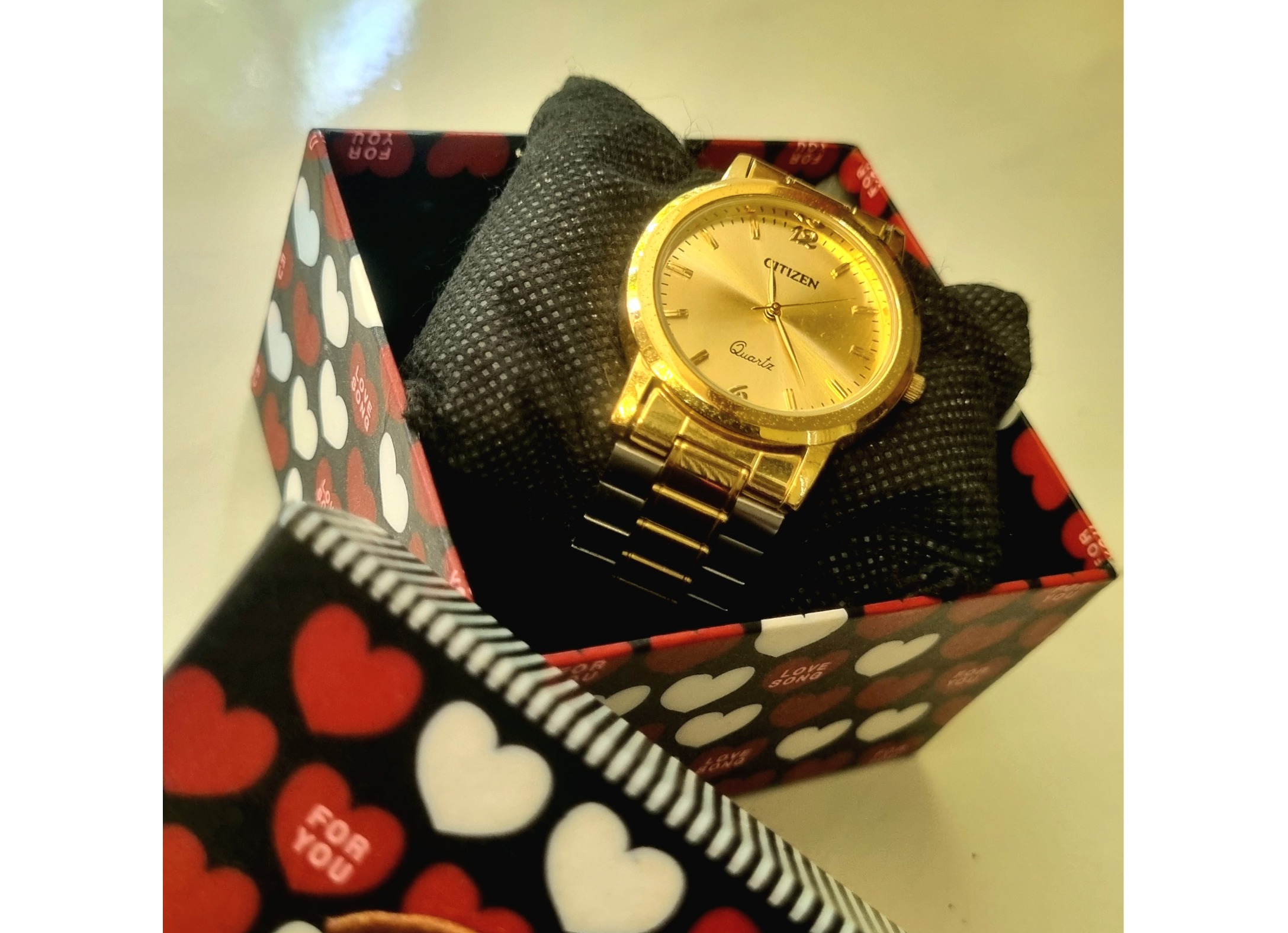 The Casual Citizen Two Tone Watch features a sleek, stylish design, blending silver and gold tones.